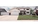 Charming two-story home with a well-manicured lawn, two car garage, and inviting curb appeal at 1772 Eisenhower, Louisville, CO 80027