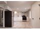 Modern kitchen features stainless steel appliances, white cabinets, and stylish backsplash at 1772 Eisenhower, Louisville, CO 80027