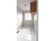 Bright laundry room with a window and clean, modern design at 1772 Eisenhower, Louisville, CO 80027