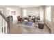 Spacious living room with hardwood flooring and modern decor featuring a comfortable seating area at 1772 Eisenhower, Louisville, CO 80027