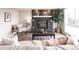 Inviting living room featuring a fireplace, comfortable seating, and stylish decor at 1772 Eisenhower, Louisville, CO 80027