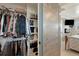 Organized walk-in closet featuring ample storage space and convenient access at 12020 W Center Ave, Lakewood, CO 80228