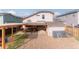 Backyard featuring a covered patio area, a pergola, and a shed at 5039 Fontana Ct, Denver, CO 80239