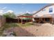 Spacious backyard featuring a pergola, a covered patio area and a fenced perimeter at 5039 Fontana Ct, Denver, CO 80239
