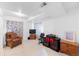 Finished basement area includes an office nook, tv, and storage at 5039 Fontana Ct, Denver, CO 80239