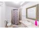 Bathroom featuring a shower and single sink at 5039 Fontana Ct, Denver, CO 80239