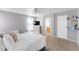 Bright primary bedroom with ensuite bathroom and walk in closet at 5039 Fontana Ct, Denver, CO 80239