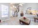Bright and spacious living room offering tile floors and an open layout perfect for entertaining at 5039 Fontana Ct, Denver, CO 80239