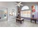 Inviting living room showcasing tile floors, abundant natural light, and a stylish decor at 5039 Fontana Ct, Denver, CO 80239