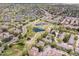Aerial view showing community, pond, and surrounding area at 4062 S Atchison Way # 302, Aurora, CO 80014