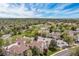 Aerial view of a well maintained community with green spaces, mature trees, and attractive residential buildings at 4062 S Atchison Way # 302, Aurora, CO 80014