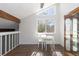 Bright dining area under vaulted ceilings featuring a well-lit dining area and a window with natural sunlight streaming in at 4062 S Atchison Way # 302, Aurora, CO 80014