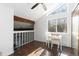 Well-lit dining area with vaulted ceilings, a large window, and a breakfast table providing a cozy and bright eating area at 4062 S Atchison Way # 302, Aurora, CO 80014