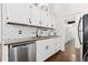 Modern kitchen with stainless steel appliances and white cabinets at 4062 S Atchison Way # 302, Aurora, CO 80014