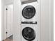 Laundry closet featuring a stacked LG washer and dryer, offering convenient in-unit laundry at 4062 S Atchison Way # 302, Aurora, CO 80014