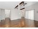 Open concept living area with hardwood flooring and vaulted ceilings at 4062 S Atchison Way # 302, Aurora, CO 80014