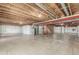 Large unfinished basement with open ceiling and concrete floor at 4665 W 108Th Ct, Westminster, CO 80031