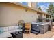Exterior deck features a hot tub, lounge seating, and a dining area, perfect for outdoor entertaining at 8966 Sunridge Hollow Rd, Parker, CO 80134