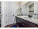 Modern bathroom with a sleek vanity, white countertops, and stylish fixtures creates a clean and inviting space at 4555 Gray Wolf Ln, Castle Rock, CO 80104