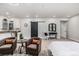 Cozy living area with kitchenette, comfortable armchairs, and stylish decorative accents at 4555 Gray Wolf Ln, Castle Rock, CO 80104