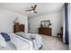Well-lit main bedroom with carpet floors and a ceiling fan; provides a comfortable and inviting space at 4555 Gray Wolf Ln, Castle Rock, CO 80104