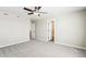 Large main bedroom with neutral walls, plush carpet and a walk-in closet at 17962 E 94Th Pl, Commerce City, CO 80022