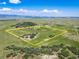 Expansive property featuring a beautiful home, pond, and plenty of space to roam with mountain views at 4586 Best Rd, Larkspur, CO 80118