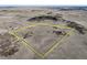 Aerial view highlighting the boundary lines of a large plot of land at 4586 Best Rd, Larkspur, CO 80118
