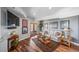 Cozy finished basement living area with TV and walk out access at 4586 Best Rd, Larkspur, CO 80118