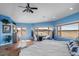 Bright, airy main bedroom featuring natural light and stunning views of the surrounding landscape at 4586 Best Rd, Larkspur, CO 80118