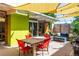 Outdoor dining area with a modern table and chairs at 1497 S Fairfax St, Denver, CO 80222