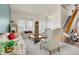Comfortable living room showcasing staircase, ample natural light, and classic decor at 19939 E Belleview Ln, Centennial, CO 80015