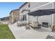 Backyard patio featuring outdoor seating and a grilling area; perfect for entertaining guests at 4781 Rosette St, Castle Rock, CO 80104