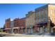 Picturesque row of brick buildings with awnings, showcasing classic architectural style on a sunny day at 4781 Rosette St, Castle Rock, CO 80104