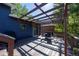 Inviting wooden deck with pergola, perfect for outdoor dining and relaxation at 1424 Cypress Cir, Lafayette, CO 80026