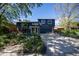 Two-story home with a two-car garage and a well manicured front yard at 1424 Cypress Cir, Lafayette, CO 80026