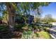 Inviting two-story home with beautiful landscaping and mature trees at 1424 Cypress Cir, Lafayette, CO 80026