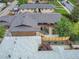 Aerial view of a home showcasing its roof, backyard, and surrounding neighborhood at 2067 Depew St, Edgewater, CO 80214