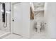 Clean bathroom with marble tile, rain shower, and a modern toilet at 2067 Depew St, Edgewater, CO 80214