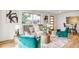 Cozy living room with stylish furniture, hardwood floors, and lots of natural light at 2067 Depew St, Edgewater, CO 80214