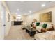 Cozy basement living area with plush seating, a wet bar, and recessed lighting at 2067 Depew St, Edgewater, CO 80214