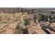 Aerial view of townhome community offering a blend of urban living with green spaces and recreational areas at 1827 Quail St # 8, Lakewood, CO 80215