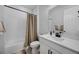 Neat bathroom featuring a shower-tub combo, modern vanity, and stylish fixtures at 16805 Greenfield Dr, Monument, CO 80132