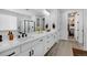 Elegant bathroom with double sinks, modern fixtures, and ample counter space at 16805 Greenfield Dr, Monument, CO 80132