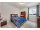 Bedroom with a comfortable bed, plush bedding, and a window for natural light at 16805 Greenfield Dr, Monument, CO 80132