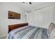 Serene bedroom showcasing a neutral color palette and a comfortable looking sleigh bed at 16805 Greenfield Dr, Monument, CO 80132