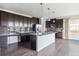 Spacious kitchen with granite countertops, stainless steel appliances, and lots of cabinet space at 13440 Monaco St, Thornton, CO 80602