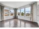 Sun-filled living area with large windows, providing lots of natural light at 13440 Monaco St, Thornton, CO 80602