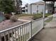 Balcony overlooking landscaped community grounds at 910 S Walden St # 101, Aurora, CO 80017