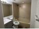 Bathroom featuring a tub, shower, sink, and vanity at 910 S Walden St # 101, Aurora, CO 80017